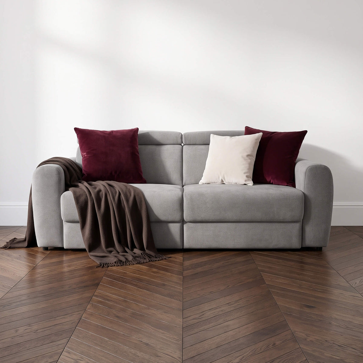 Flex Grey 3 Seater Power Slider Sofa with burgundy cushions and dark throw in a contemporary living room