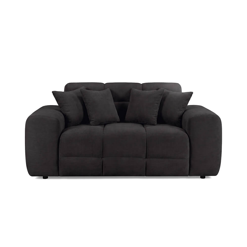 Dark 2-seater sofa with tufted seat, three cushions, and back pillows