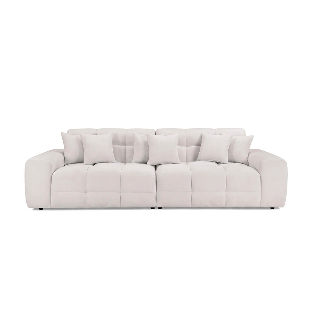 Light beige 4-seat sofa with tufted cushions and squared arms with multiple back cushions
