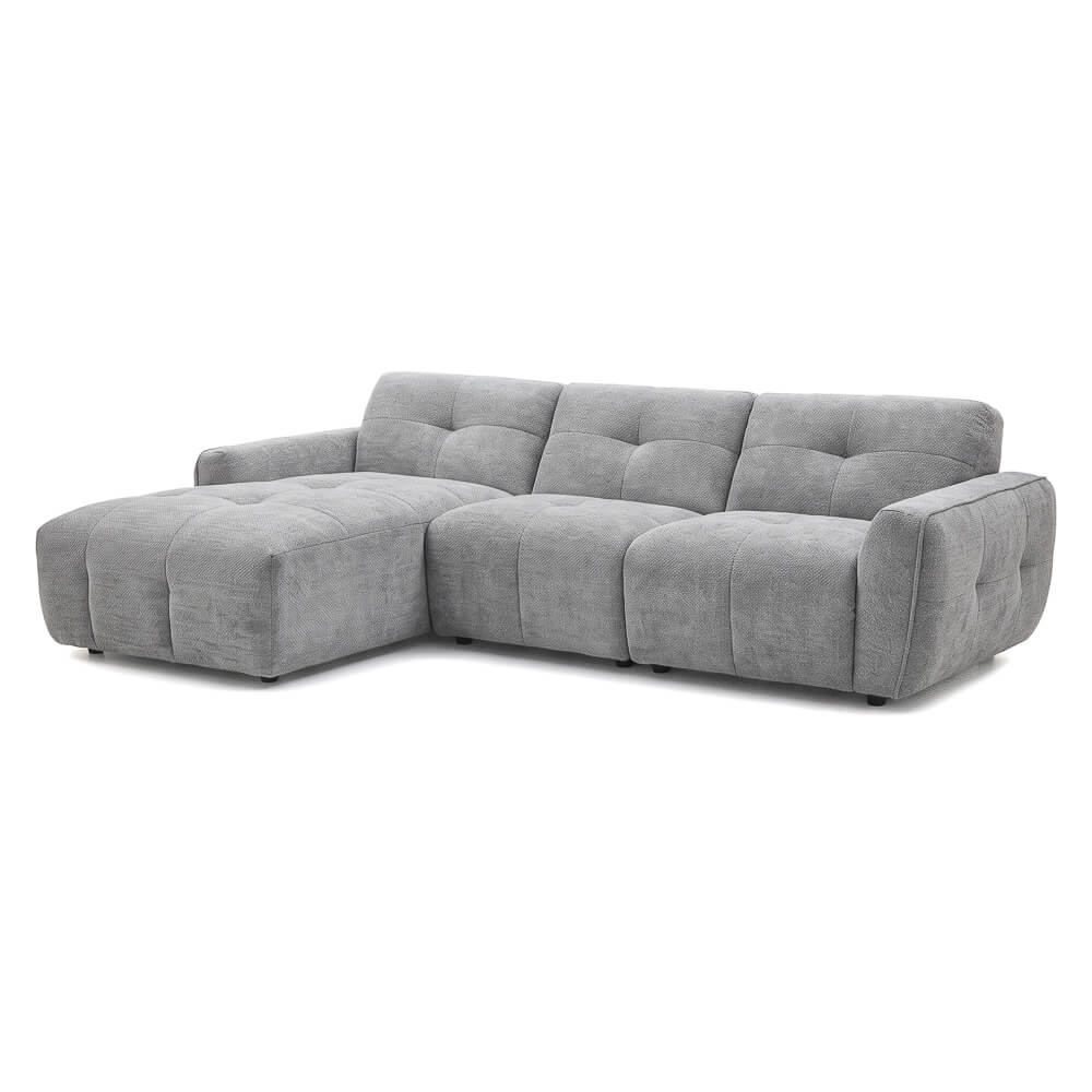 Light grey left-corner sectional sofa with modular chaise and tufted back cushions