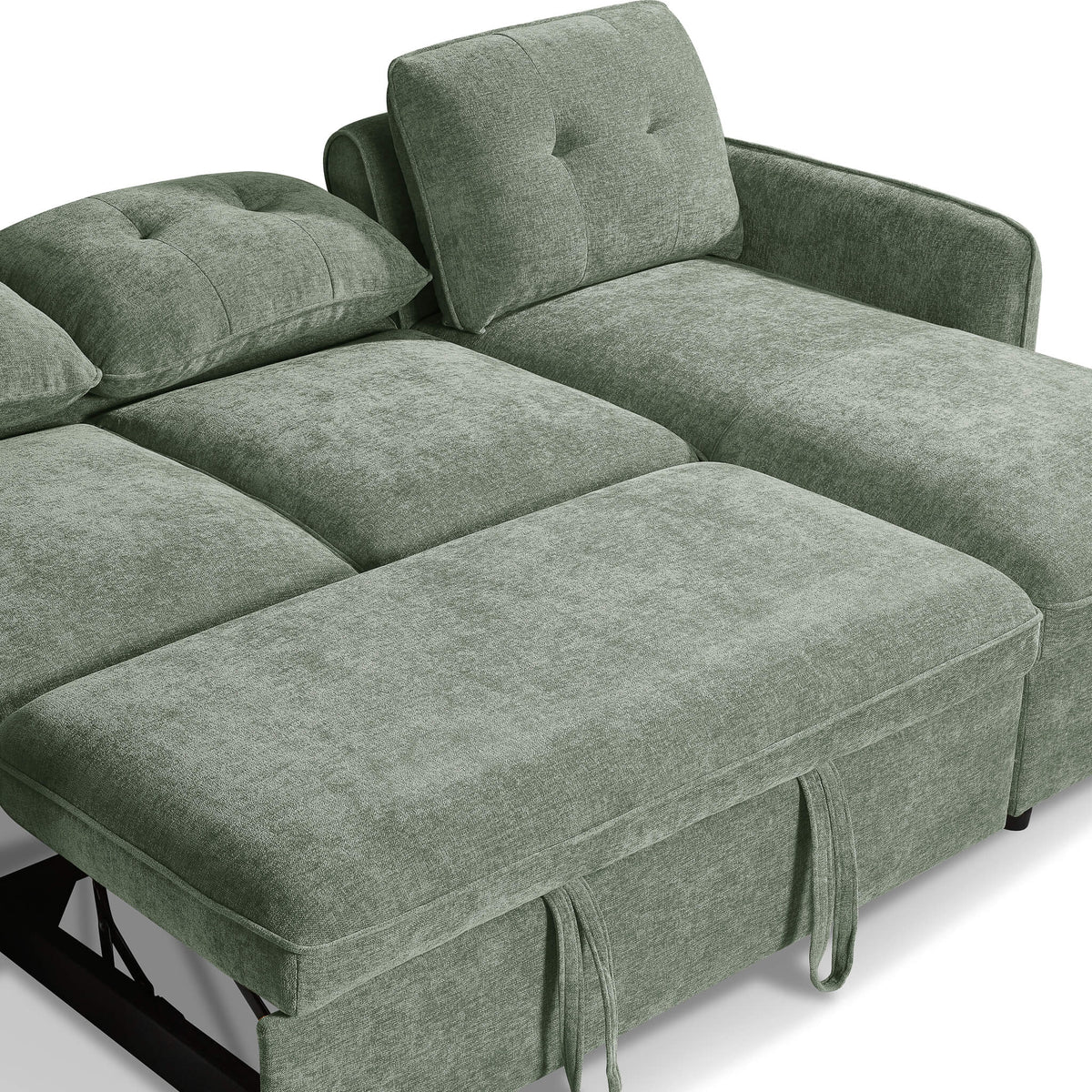 Green fabric sofa bed with extended chaise and cushioned backrest, ties hanging at edge
