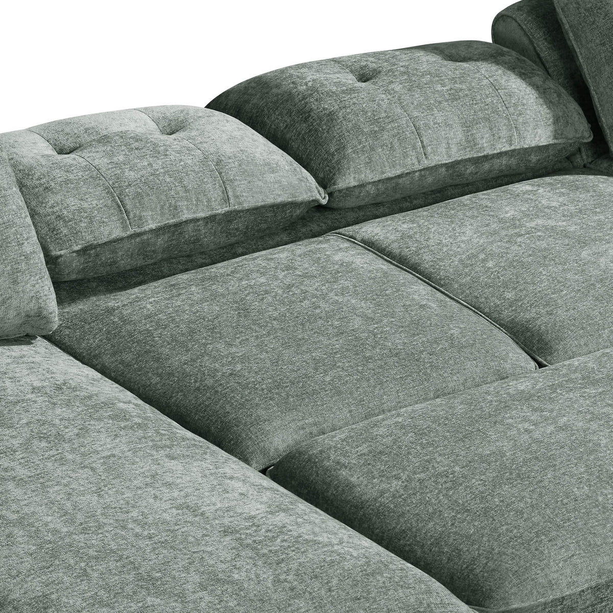 Green sofa bed with upholstered seat and back cushions, tufted seams and piping