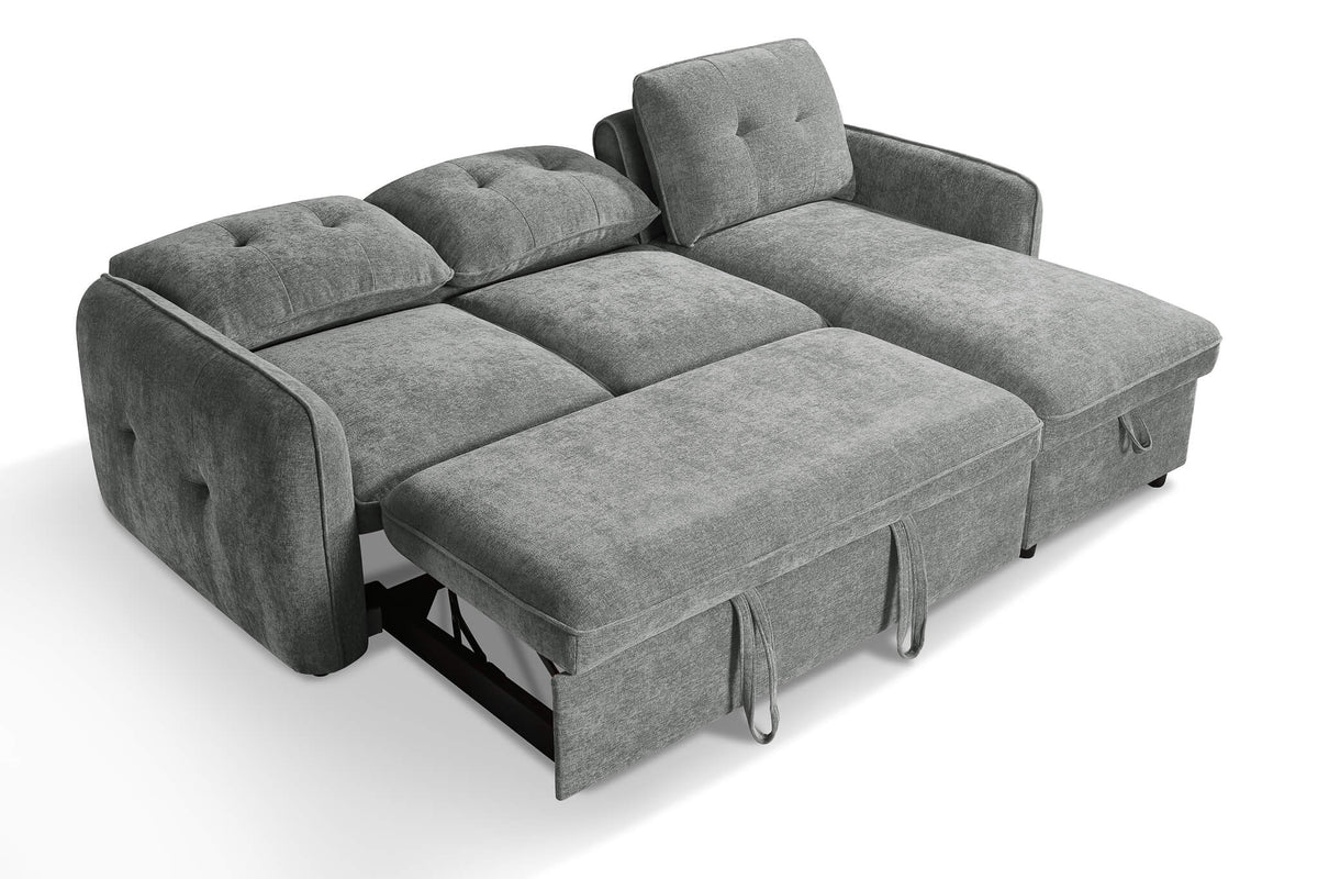 Grey corner sofa bed fully extended with tufted seat cushions and pull-out mattress