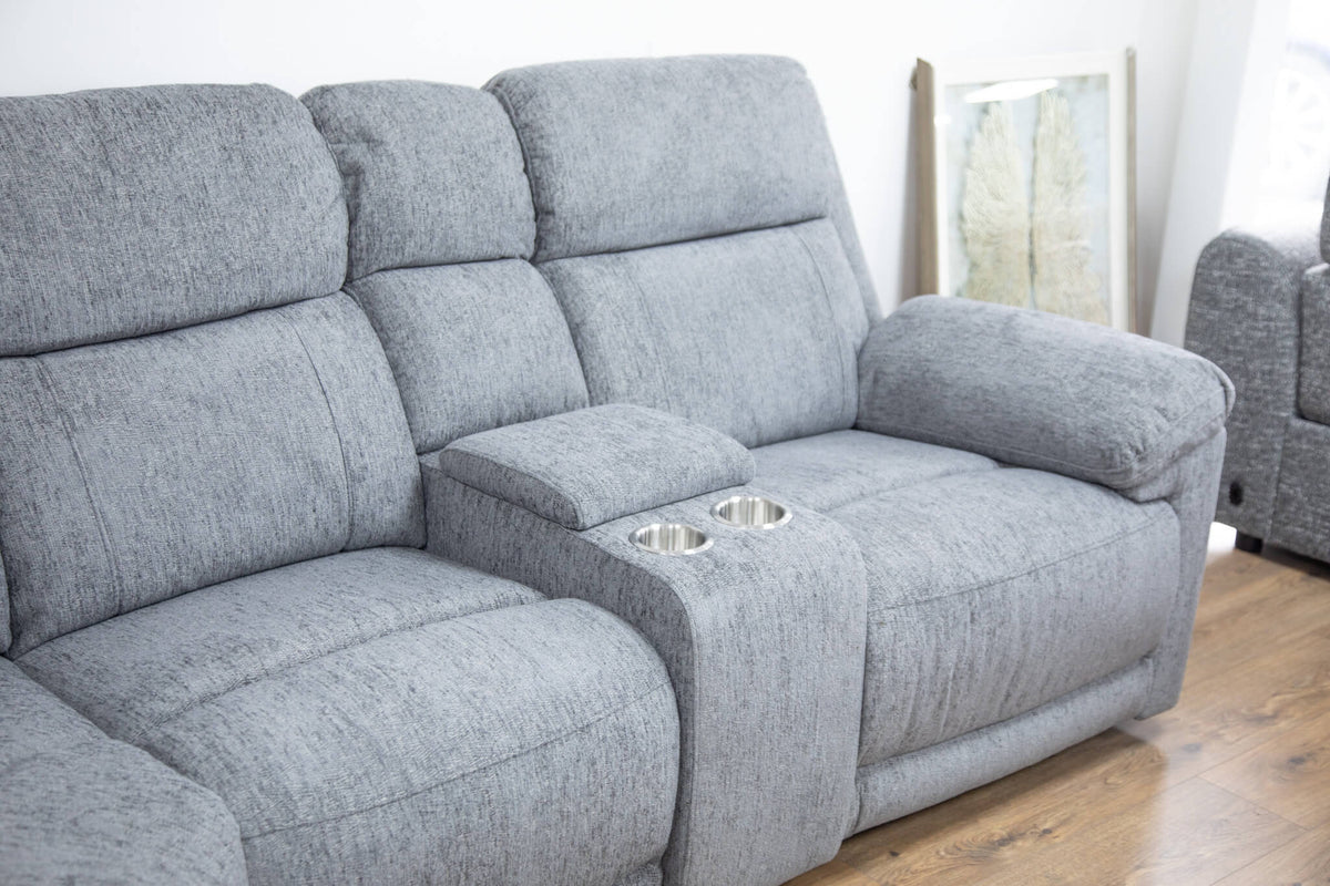 Grey corner recliner sofa with extended footrests and cup-holder console
