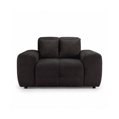 Dark fabric armchair with two back pillows, tufted seat, and short black legs