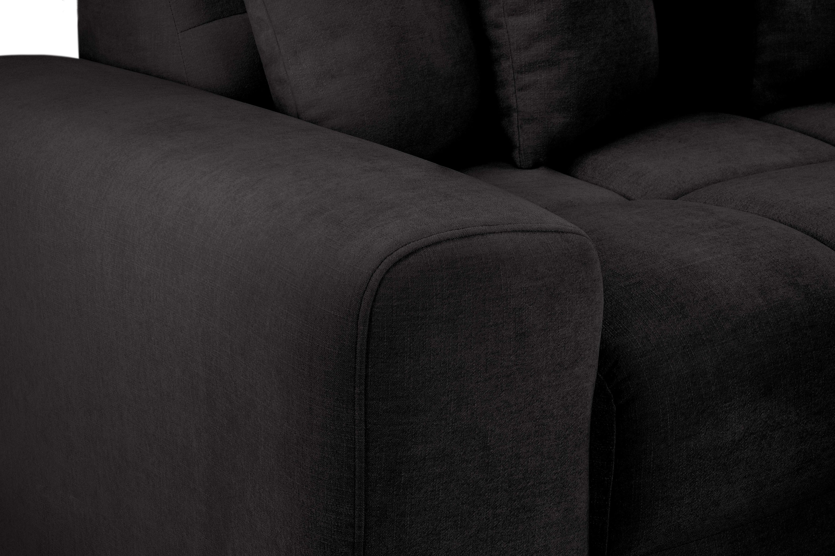 Close up of a black fabric sofa armrest