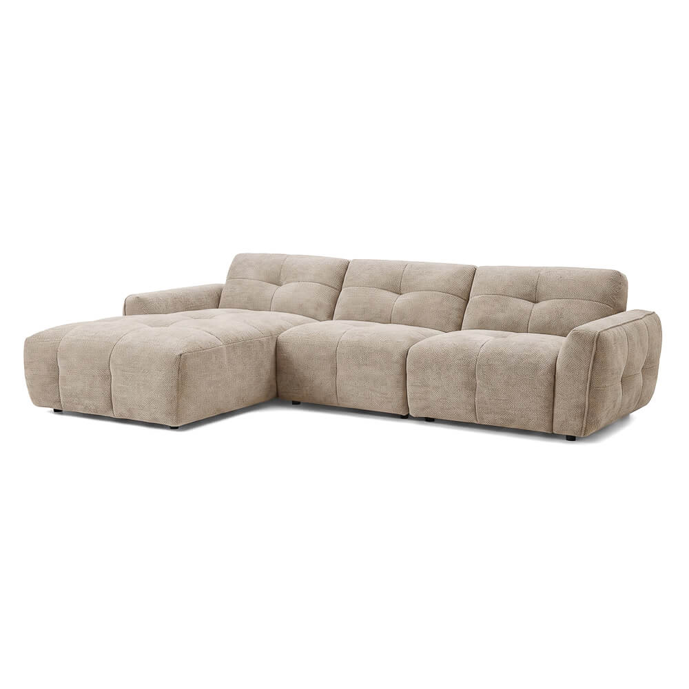 Beige left corner sofa with tufted back cushions and padded armrests, fabric upholstery.