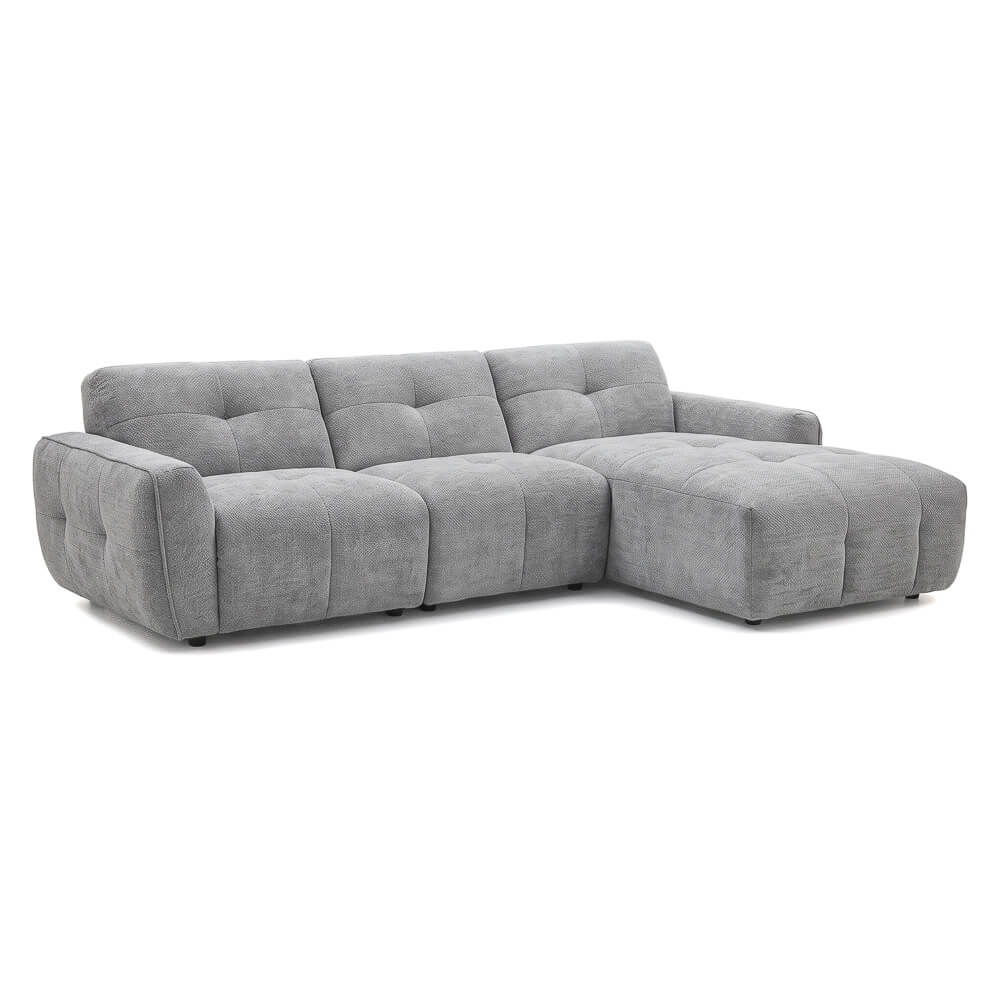 Grey right-corner fabric sectional sofa with tufted back cushions and chaise seat