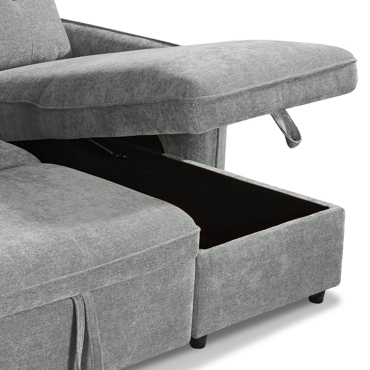 Grey corner sofa bed side view with open storage bed base and hanging strap tabs