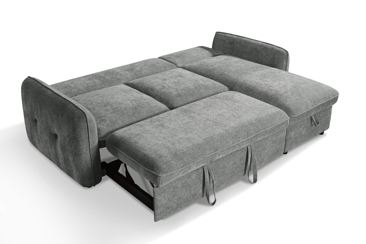 Grey upholstered corner sofa bed with open pull-out bed panels and side armrests