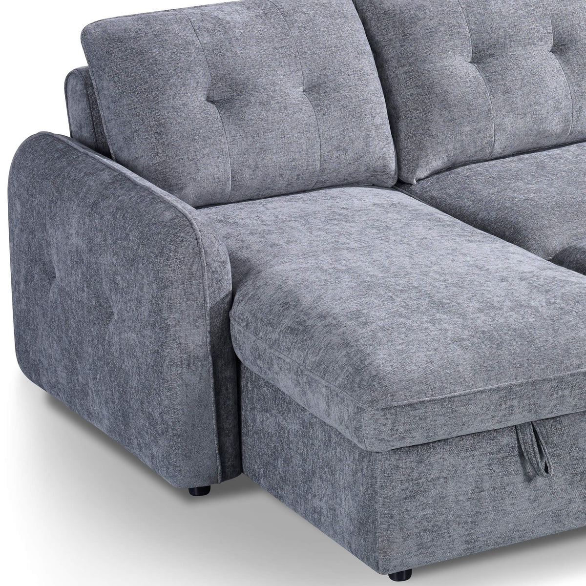 Grey sofa bed corner section with wide seat cushion and tall tufted back rests