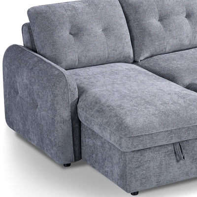 Grey sofa bed corner section with wide seat cushion and tall tufted back rests