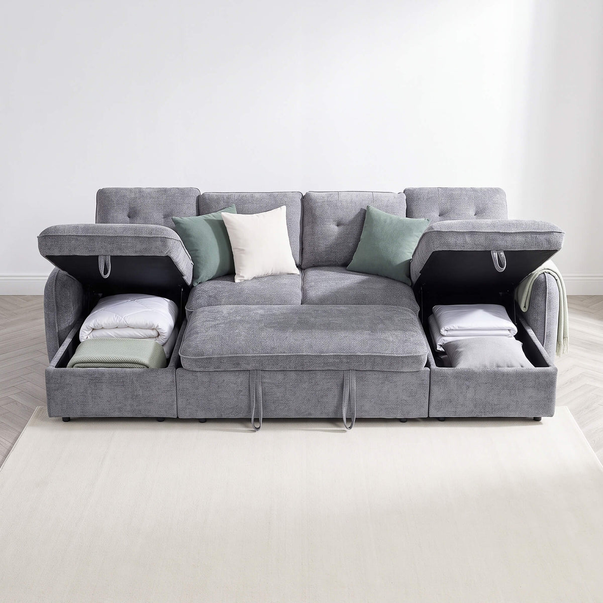 Grey sofa bed with removable-style cushions and light pillows in U-corner layout