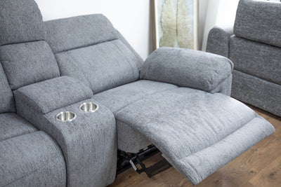 Grey corner recliner sofa with reclined chaise seat and built-in cup-holder console