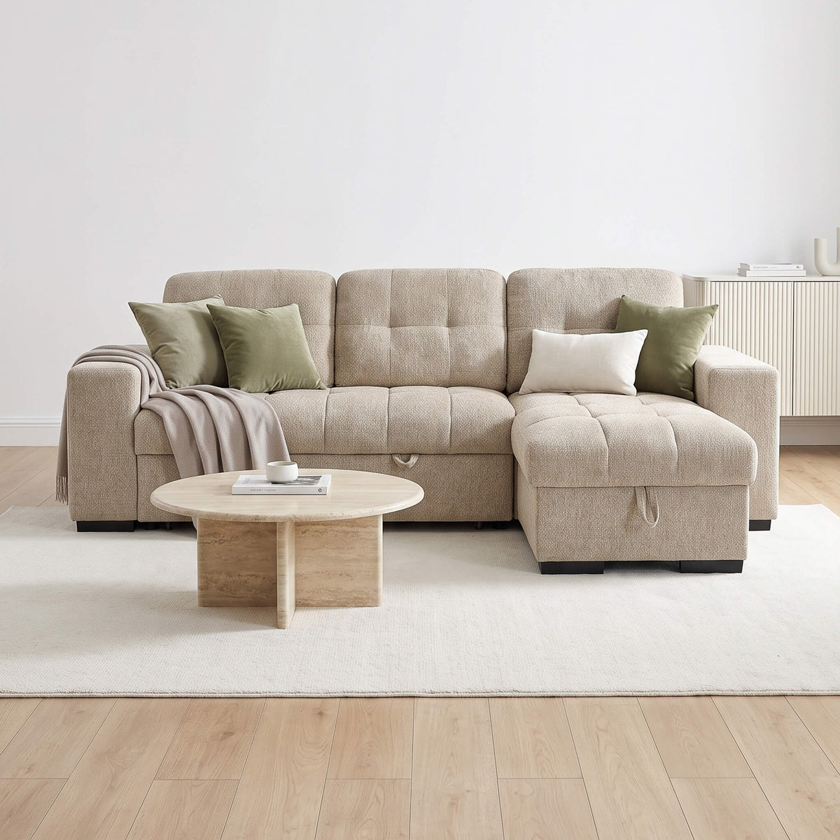 Beige corner sofa bed with loose cushions, square arms, and accent throw pillows.