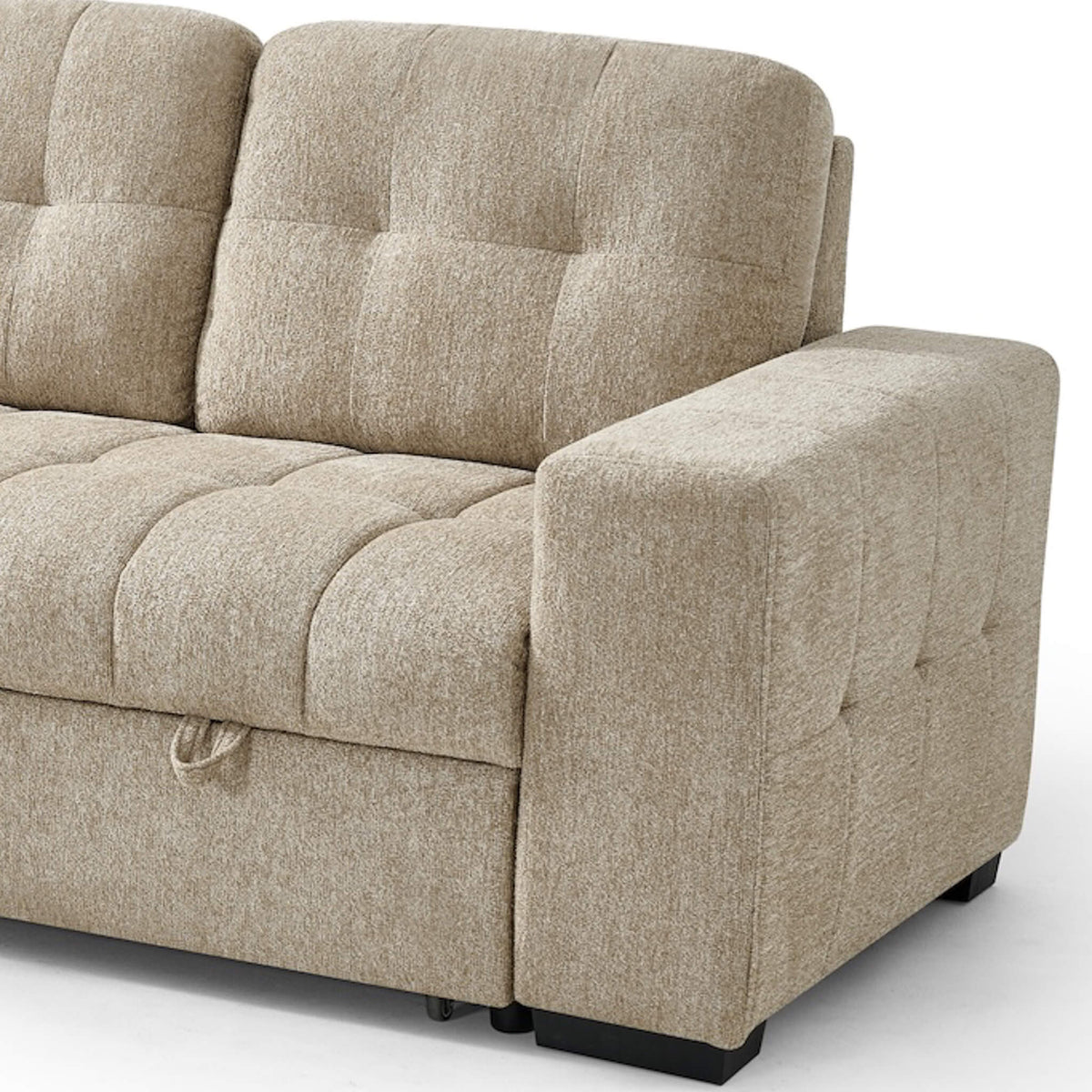 Beige corner sofa bed with padded armrests, tufted seat, and chaise extension.