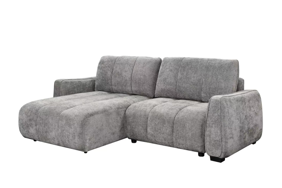 Grey corner sofa bed with two-section chaise, square arms and segmented seat cushions.